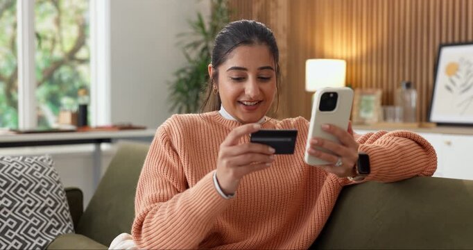 Woman, phone and online shopping in home with credit card, payment and happy for website promotion. Person, smile and typing in apartment with tech, digital banking or savings for ecommerce purchase.