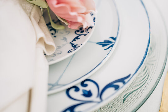 Elegant blue and white plates creating beautiful table setting