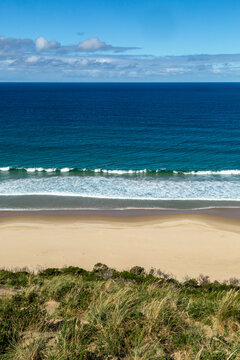 Waves, beach, and dunes at Neck Beach, Bruny Island