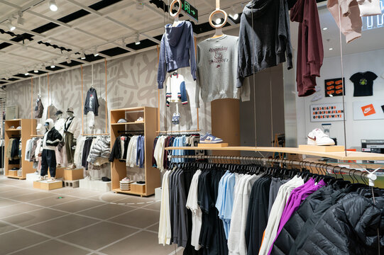 Nike apparel displayed inside Kicks Lounge store