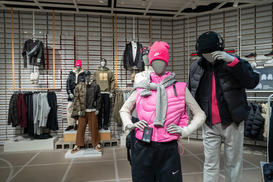 Dressed mannequins displayed inside the Nike Kicks Lounge