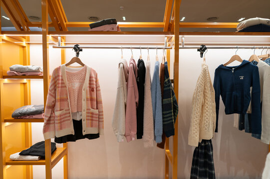 Apparel displayed on racks inside I.T store at KK Mall