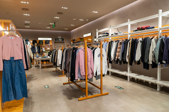Apparel displayed on racks inside I.T store at KK Mall