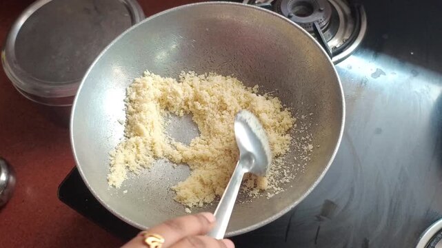 Roasting Suji (Semolina) in a Kadhai for Making Halwa or Upma