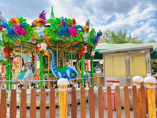 carousel in the park © Babarali