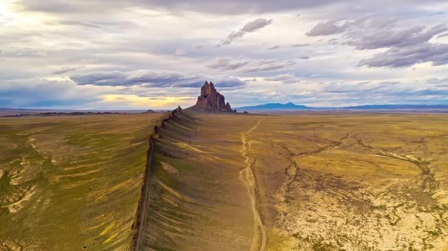 Aerial view of Shiprock monolith and surrounding arid landscape in cinematic aerial landscape footage