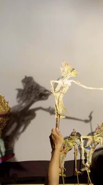 Vertical Wayang Puppet Close Performance