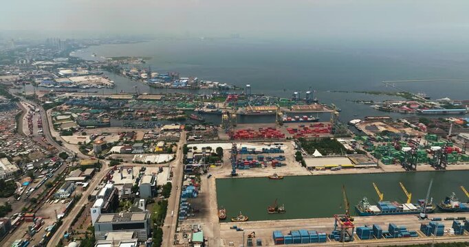 Container terminal with cargo ships. Tanjung Priok sea port. Indonesia.
