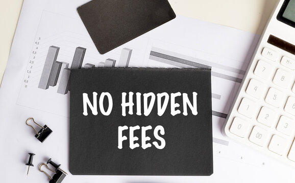 No hidden fees concept with calculator, financial charts and office supplies representing transparent pricing, cost disclosure, fair billing,