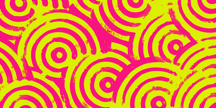 Swirling pattern with concentric circles in pink and yellow hues