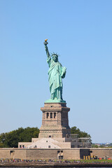 Statue of Liberty on Liberty Island under a clear blue sky in New York City USA © ChiccoDodiFC
