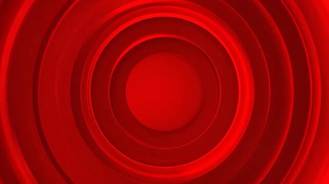 Abstract red concentric circles creating a vibrant 3D geometric tunnel background