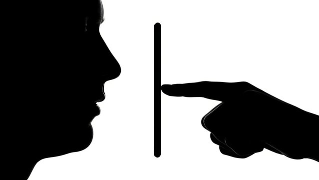 A black silhouette of a human head facing right, with a hand pointing at a vertical line separating them