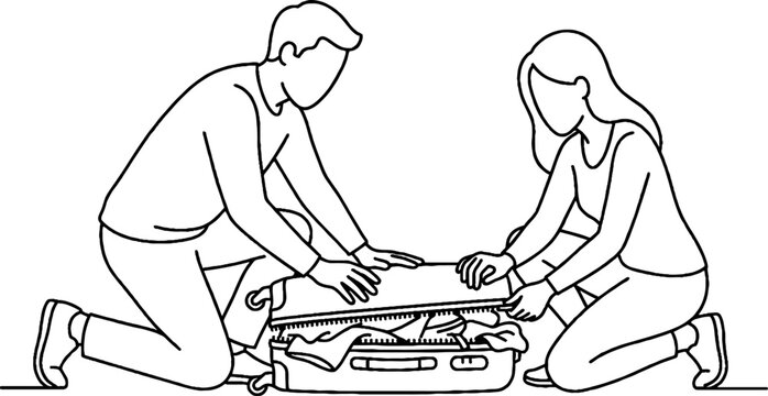 Couple packing suitcase together for travel.