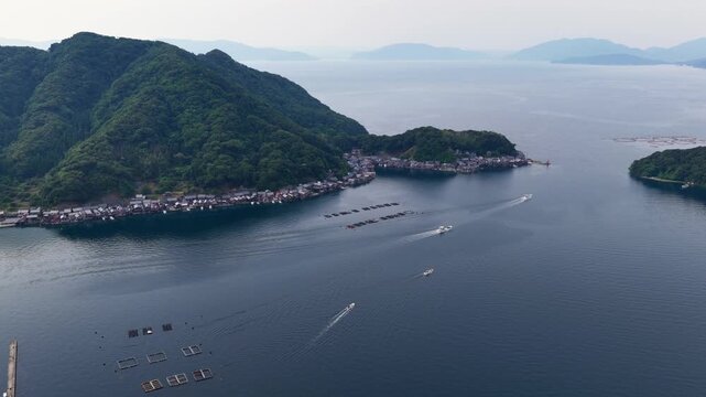Aerial Flight Toward the Traditional Funaya Boathouses of Ine Bay, Kyoto, Japan