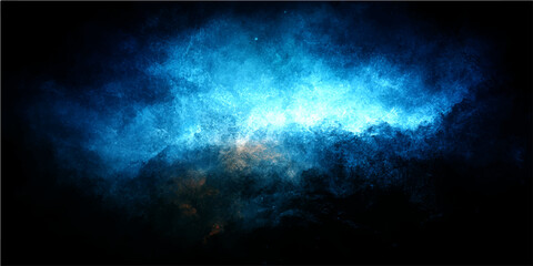 Abstract blue cosmic nebula with glowing light and stardust in deep space, evoking mystery and wonder. © Zìyóu