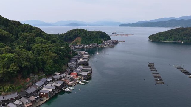 Aerial Flight Along the Historic Funaya Waterfront in Ine Bay, Kyoto Japan