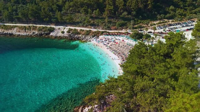 Crowded Marble Beach on Sunny Day, Thassos Island, Greece