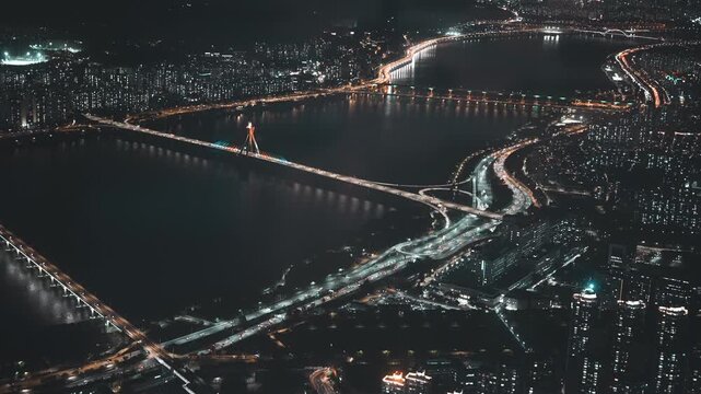 High angle night view of Olympic bridge and traffic interchange in Seoul - 화려한 불빛의 아파트 단지와 한강 다리의 아름다운 서울 야경 드론 풍경