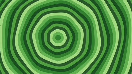 Green concentric circles pattern with organic wavy lines resembling tree trunk wood texture. © Rafsunjany