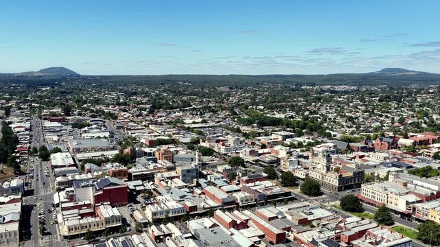 Slow aerial panorama over Ballarat city downtown streets and buildings &ndash; Australia.