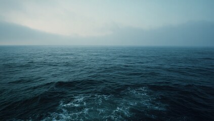 Fototapeta premium Vast Ocean Horizon Under a Cloudy Sky.