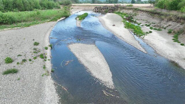 Drought river dry wetland, swamp Becva drone aerial pond drying up very meander the soil cracked stream crust earth climate change, environmental disaster and earth cracks very, death for plants and