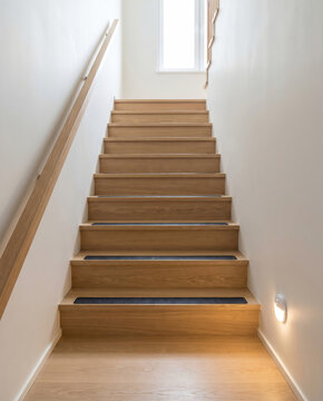 Home stair safety strips and handrail in place