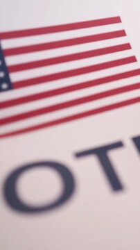 A U.S. citizen holding a ballot at a polling station during the U.S. Congressional midterm elections