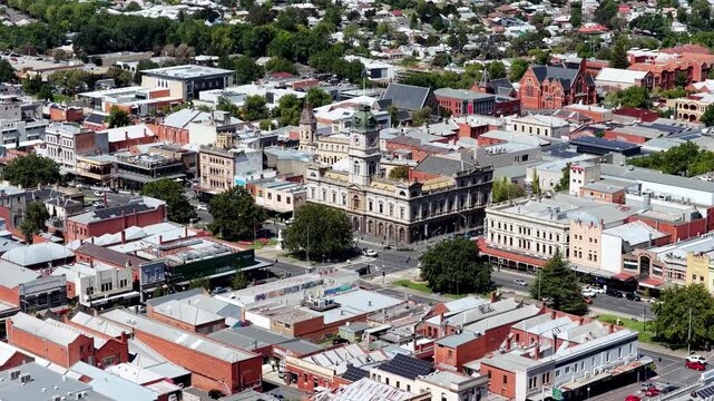 Landing aerial cityscape view of Ballarat city downtown in regional Victoria, Australia.