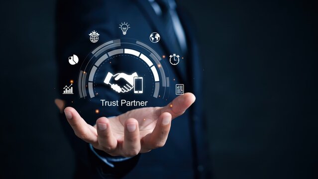 Business person holding a digital trust partner handshake icon in their hand