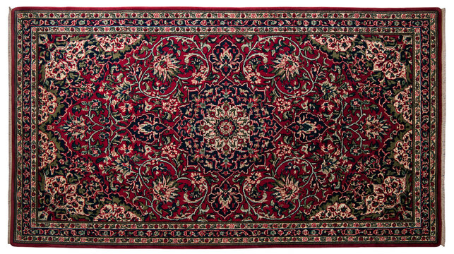 Persian rug with intricate floral pattern in red blue, and green