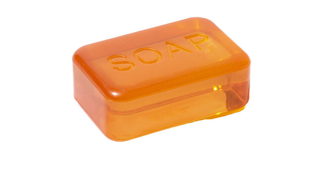 Orange translucent soap bar with embossed word SOAP