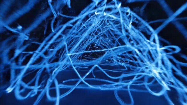 Chaotic Blue 3D Light Painting Scribbles Tangled Glowing Lines in Dark Space