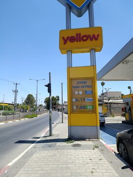 Ramle, Israel &ndash; 19.06.2026. Gas station Yellow scene with visible fuel prices on a digital display. Concept of gasoline prices and fuel costs. Oil petrol station.