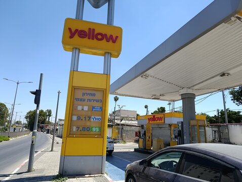 Ramle, Israel &ndash; 19.06.2026. Gas station Yellow scene with visible fuel prices on a digital display. Concept of gasoline prices and fuel costs. Oil petrol station.
