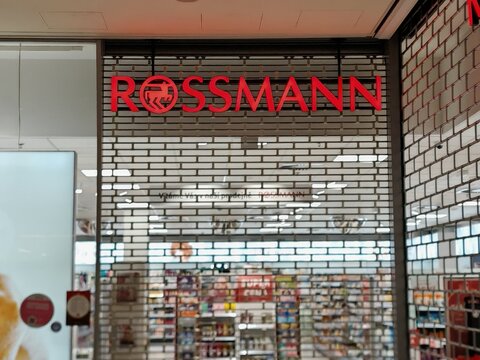 Prague,Czech Republic-April 2 2026: Rossmann drugstore logo visible behind a closed storefront shutter inside a shopping center