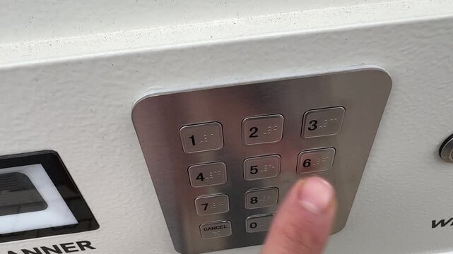 Manually entering a security code on a keypad, symbolic representation 4k