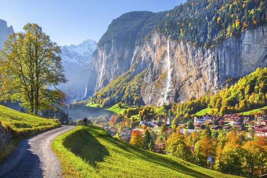 View of town and valley with Staubbach waterfall in autumn, Lauterbrunnen, Bernese Oberland, Canton of Bern, Switzerland