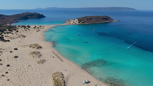 Discover the stunning turquoise waters and soft golden sands of Simos Beach in Elafonisos Greece. Perfect for relaxation, swimming, and soaking up the sun in a picturesque setting.
