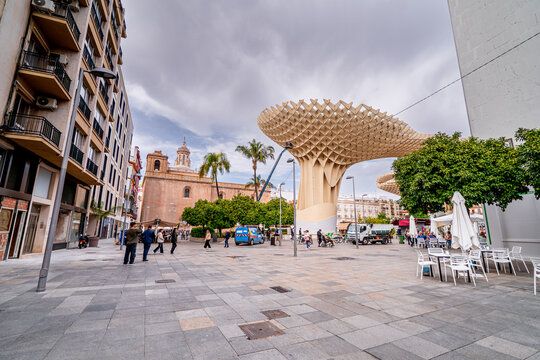 Futuristic wooden Setas de Sevilla building in Plaza de la Encarnaci&oacute;n with people, Seville, Spain, Andalusia.