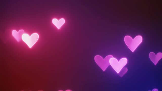 Abstract Heart-Shaped Bokeh Lights Fading in Purple and Pink Gradient Seamless Loop