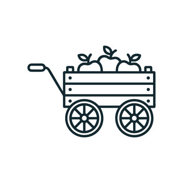 Wooden wagon with green apples.
