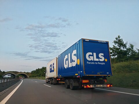 Prague,Czech Republic-April 2 2026: GLS delivery truck entering logistics distribution center for parcel transportation and supply chain operations