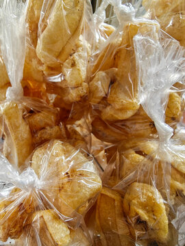 Close Up of Traditional Indonesian Crispy Rambak Cowhide Crackers in Plastic Bags