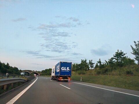 Prague,Czech Republic-April 2 2026: GLS delivery truck entering logistics distribution center for parcel transportation and supply chain operations