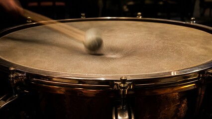 Fototapeta premium timpani. Timpani drumhead with blurred mallet impact and deep vibration. product launch decks, UI/UX mockups, designed for product launches and innovation pitches, clarifies data.