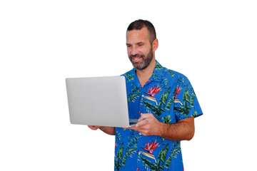 Man in an aloha shirt smiling, working on laptop, embracing remote work and digital nomad lifestyle with transparent background © Komora