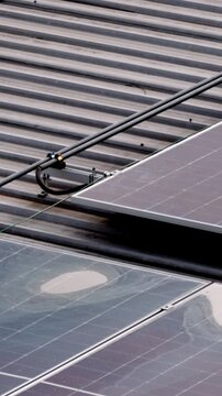 Small puddles on solar panels because panels are mounted at too low tilt angles , the standing water can cause localized shading and reduce overall energy production.