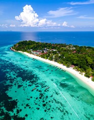 Fototapeta premium Aerial view of a tropical island with turquoise waters